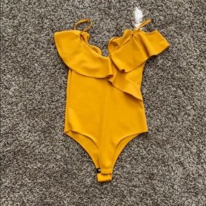 Yellow bodysuit